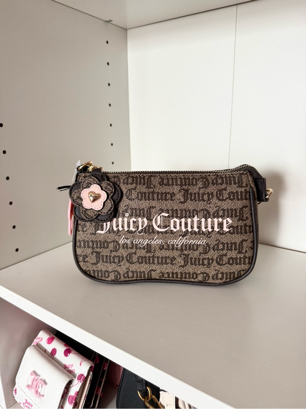 Juicy Couture “Summer Garden” Brown Logo Wristlet with Pink Flower Charm
